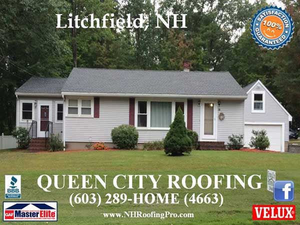 Gray house with garage in Litchfield, NH