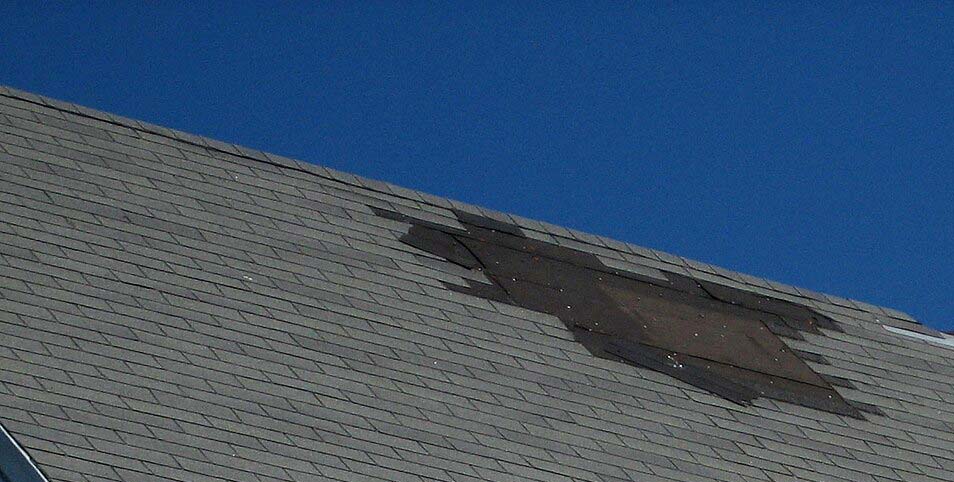 Wind damaged roof